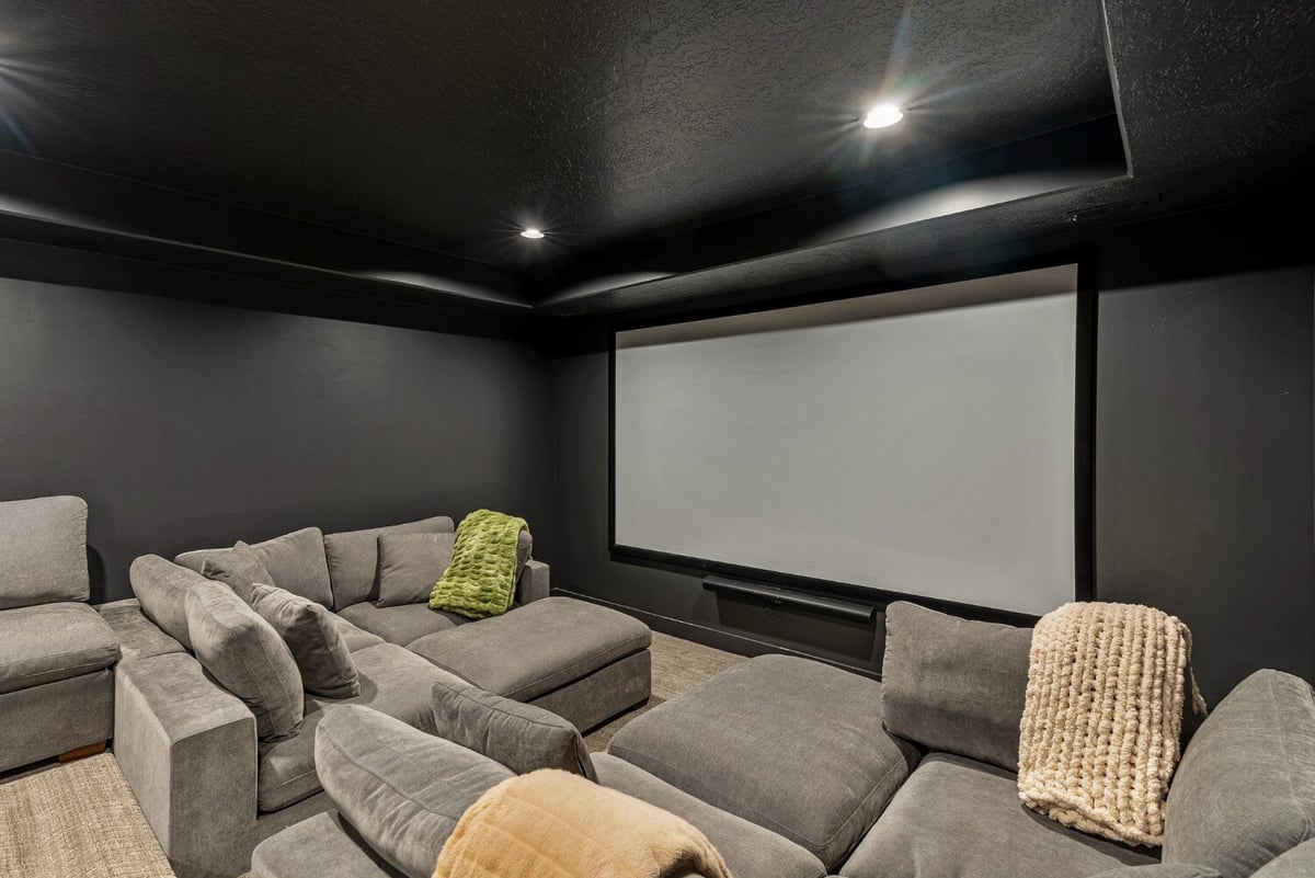 Home Theater Movie Screen for Projector in Bear Lake Custom Home by 10X Builders