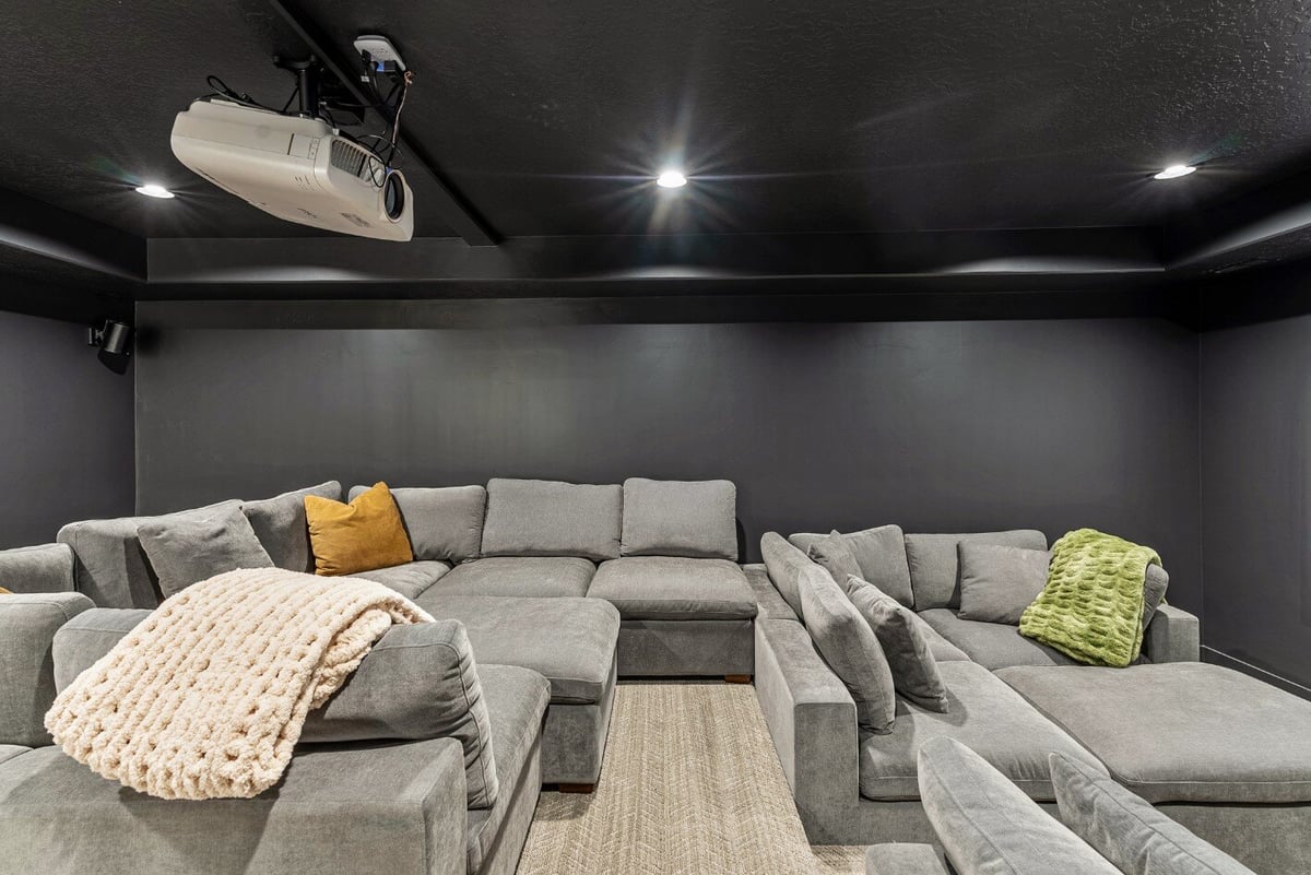 Large Gray Sectionals in Home Theater in Bear Lake Custom Home by 10X Builders