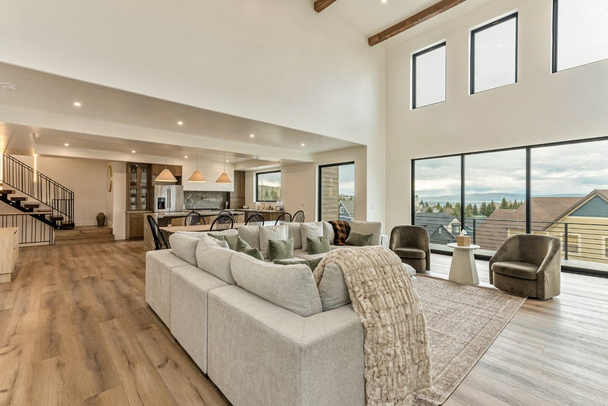 View of Living Room Into Dining Area and Kitchen of Bear Lake Custom Home by 10X Builders