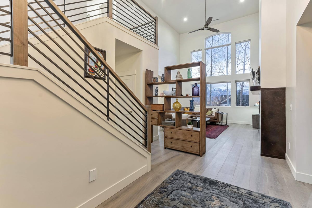 Entryway Stairwell Into Living Room of Remodeled Home in Utah