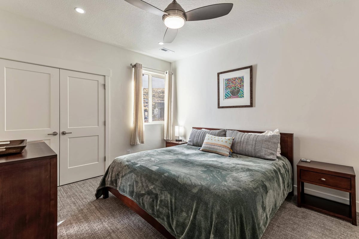 Guest Bedroom with Two Door Closet in Remodeled Utah Home