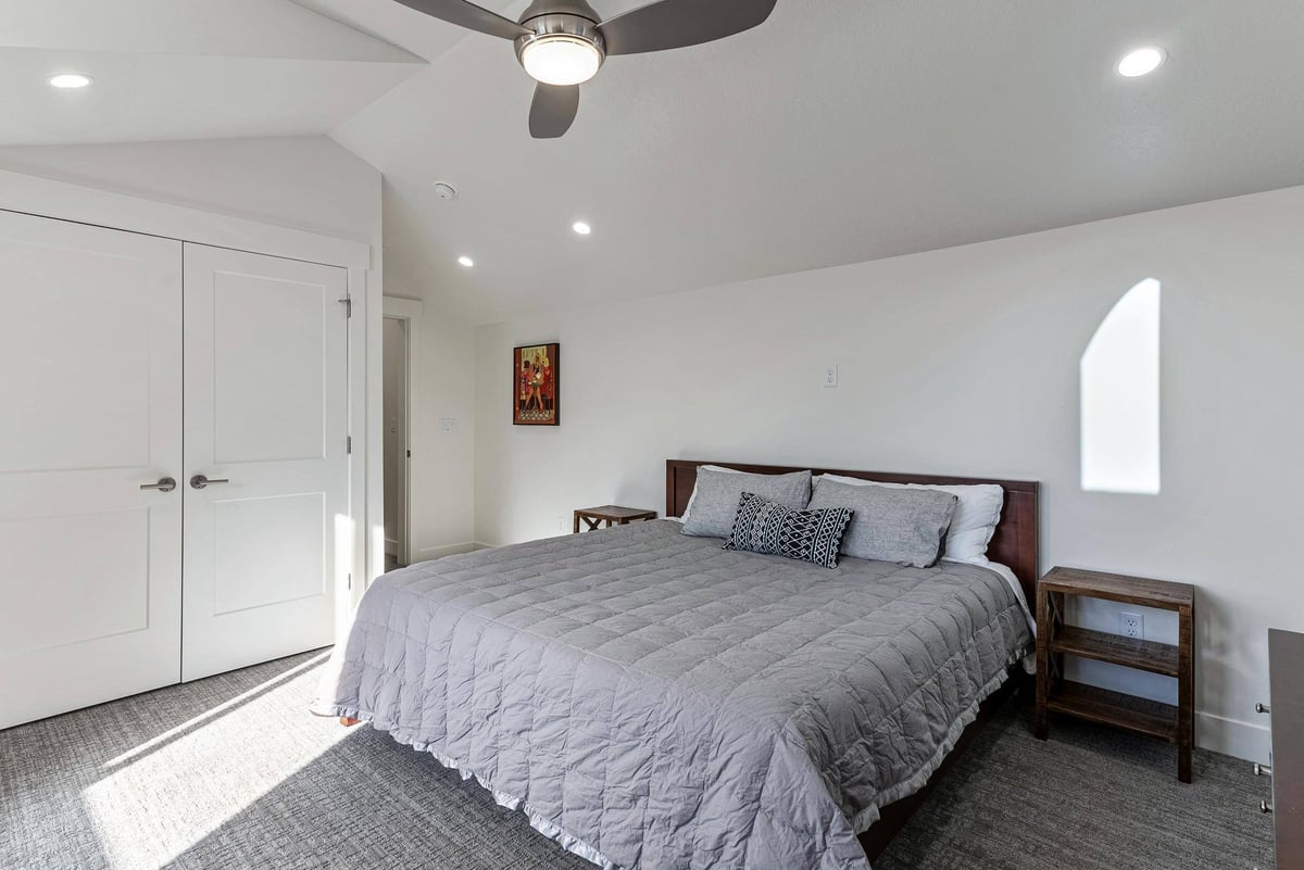 Spare Bedroom Bed and Two Door Closet in Remodeled Utah Home