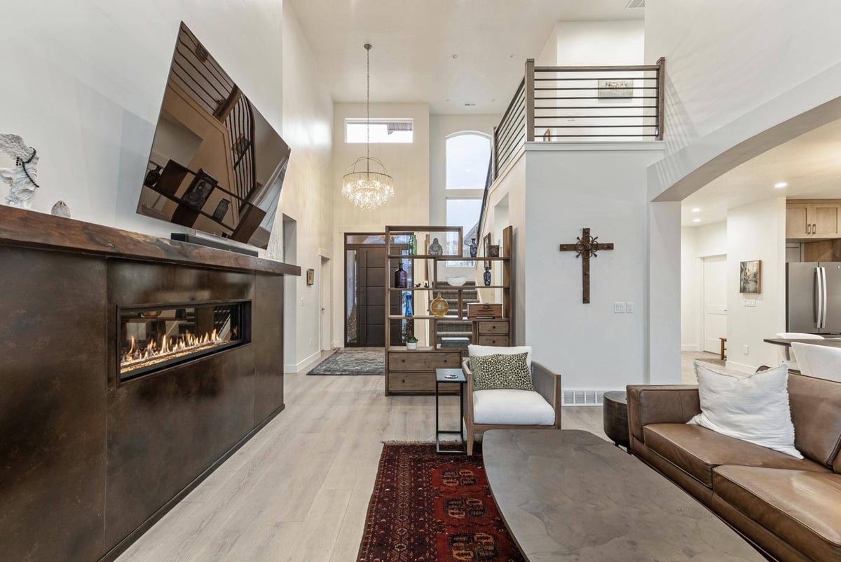 View of Entryway Loft Stairs From Living Room of Remodeled Utah Hom